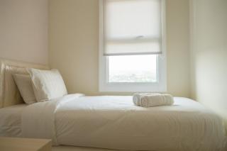 Compact 2BR with Sofa Bed at Parahyangan Residence By Travelio - 9