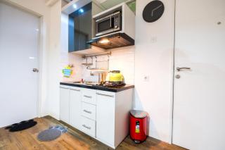 Modern and Comfy 3BR Bassura City Apartment By Travelio - 5