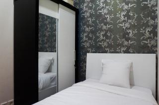 Strategic 2BR Apartment at Trillium Residence By Travelio - Surabaya - 9