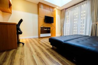 Exclusive 1BR Casa De Parco Apartment near AEON Mall By Travelio - 1