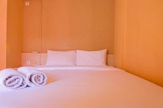 Affordable Price 2BR Green Pramuka City Apartment By Travelio - 8