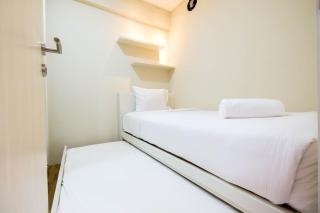 Connect to Pool 2BR Apartment at Bassura City By Travelio - 6