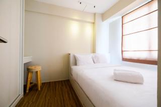 Connect to Pool 2BR Apartment at Bassura City By Travelio - 2