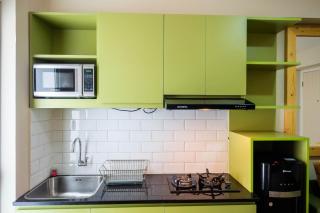 Connect to Pool 2BR Apartment at Bassura City By Travelio - 4