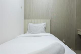 Strategic and Cozy 2BR Bassura City Apartment By Travelio - Jacarta - 4