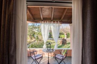 Tellis Holiday Rooms - Moraitika - 9