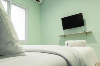Simple Studio Room at Guest House Way Seputih near Central Park By Travelio - Jakarta - 4