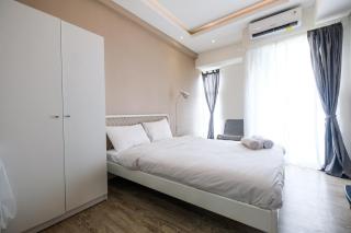 Modern Studio Akasa Pure Living BSD Apartment By Travelio - 0
