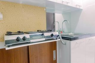 Compact Studio Room at Tamansari Papilio Apartment By Travelio - 7