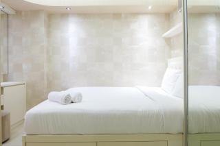 Compact 2BR Bassura City Apartment By Travelio - 3