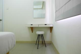 Tranquil 2BR @ Green Pramuka Apartment By Travelio - 8
