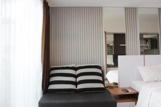 Bright Studio @ Tamansari La Grande Apartment By Travelio - Bandung - 1