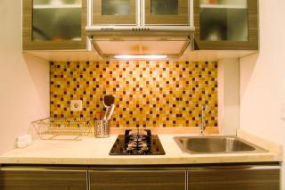 Deluxe and Modern Studio M Gold Tower Apartment By Travelio - Bekasi - 1