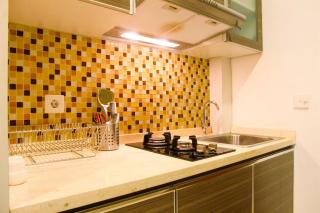 Deluxe and Modern Studio M Gold Tower Apartment By Travelio - Bekasi - 4