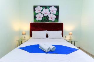 Labuana Homestay and Cafe Garden Makassar - Makassar - 1