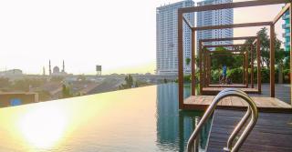 Cozy Studio Apartment Grand Kamala Lagoon By Travelio - Bekasi - 5