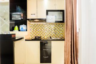 Simply 2BR with Pool View Bassura City Apartment By Travelio - 4