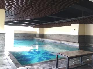 Premium Studio Room @ Tamansari La Grande Apartment By Travelio - 4
