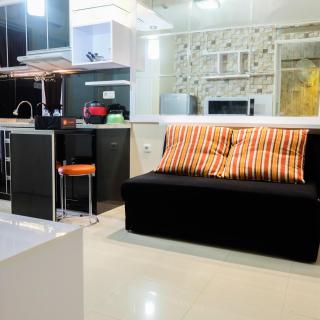 Modern 2BR with City View at Bassura Apartment By Travelio - 5