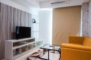 Premium 1BR Apartement At Grand Sungkono Lagoon By Travelio - Surabaya - 4