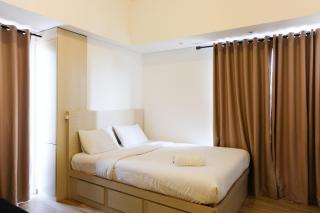 Cozy and Compact Casa De Parco Studio Apartment By Travelio - Tangerang - 4
