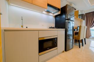 Spacious Studio Room at Capitol Suites Apartment By Travelio - 5