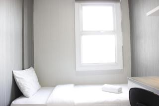 Quiet 2BR Apartment @ Parahyangan Residence Apartement with Mountain View By Travelio - 9