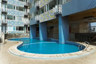 Compact Studio Saladdin Mansion Apartment By Travelio - Depok - 3
