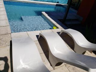 ViviSierras, Carlos Paz casa centro frente al lago, pileta climatizada, 4 dormitorios, 3 baños, quincho - Villa Carlos Paz - 4