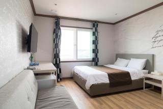 Seongsan Aqua Beach Hotel - Seogwipo - 9