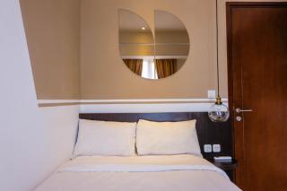 Elegant 2BR Apartment at M-Town Signature near Shopping Mall By Travelio - 7