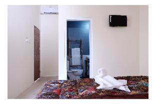 Hinggil Homestay Syariah Malioboro Yogya Mitra RedDoorz - Yogyakarta - 7