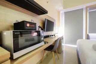 Fully Furnished Studio No Kitchen Apartment at Mustika Golf Residence By Travelio - Bekasi - 4