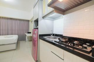 Elegant Studio Room at Springlake Summarecon Apartment By Travelio - Bekasi - 6