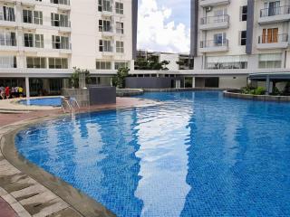 Cozy & Tranquil 1BR Apartment Casa De Parco BSD By Travelio - 1