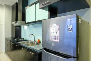 Stunning 2BR with Private Lift at Masterpiece The Epicentrum Kuningan Apartment By Travelio - 6