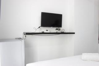 Stylish Studio Room Grand Asia Afrika Apartment By Travelio - 5