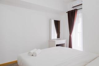 Elegant and Convenient 2BR M-Town Residence Apartment By Travelio - Pumpangsineng - 1