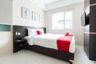 RedDoorz Plus At Harvest Inn Panakkukang - Pampang - 9