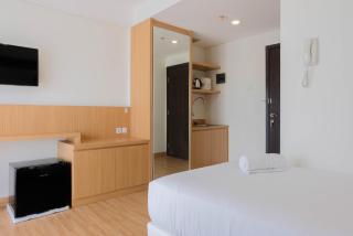 Twin Bed Studio Room at Annora Living Apartment By Travelio - 2