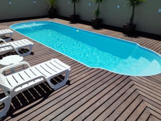 CASA AMBAR COM PISCINA EM Mariscal BOMBINHAS N 705 - Canto Grande - 0