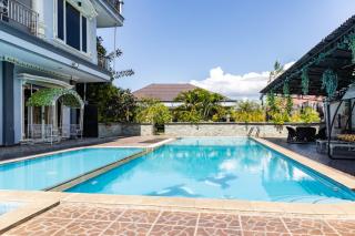RedDoorz Premium @ Sea Residence Manado - Manado - 0