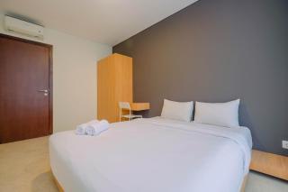 Modern and Spacious 2BR L'Avenue Apartment By Travelio - 9