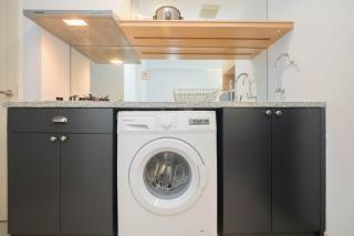 Modern and Spacious Studio Grand Kamala Lagoon Apartment By Travelio - 1