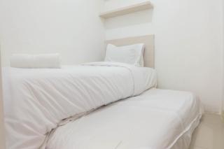Warm and Cozy 2BR Green Pramuka Apartment near Mall By Travelio - 6