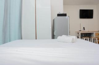 Comfy and Warm Studio Grand Kamala Lagoon Apartment By Travelio - 6