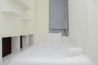 Pleasant and Modern 2BR Grand Kamala Lagoon Apartment By Travelio - Bekasi - 8