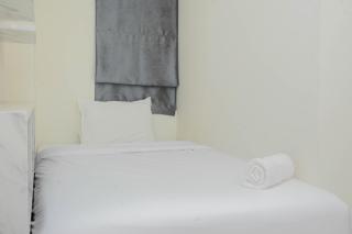 Pleasant and Modern 2BR Grand Kamala Lagoon Apartment By Travelio - Bekasi - 7