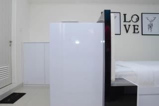 Pleasant and Modern Studio Grand Kamala Lagoon Apartment By Travelio - Bekasi - 1