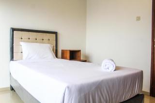 Homey and Warm 3BR Apartment at Ambassade Residences By Travelio - 2